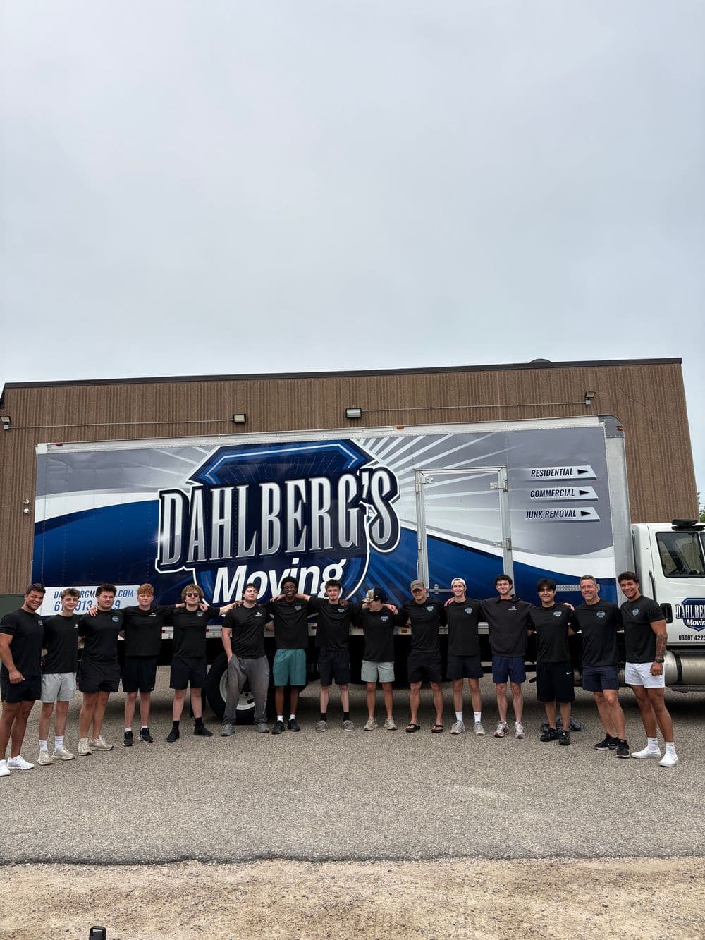 Professional movers handling household furniture with care